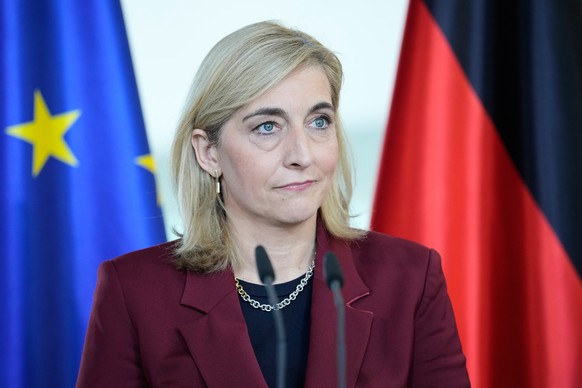 German Health Minister Nina Warken attends a joint press conference with German Chancellor Friedrich Merz after the cabinet meeting at the chancellery in Berlin, Germany, Wednesday, April 29, 2026. (A ...