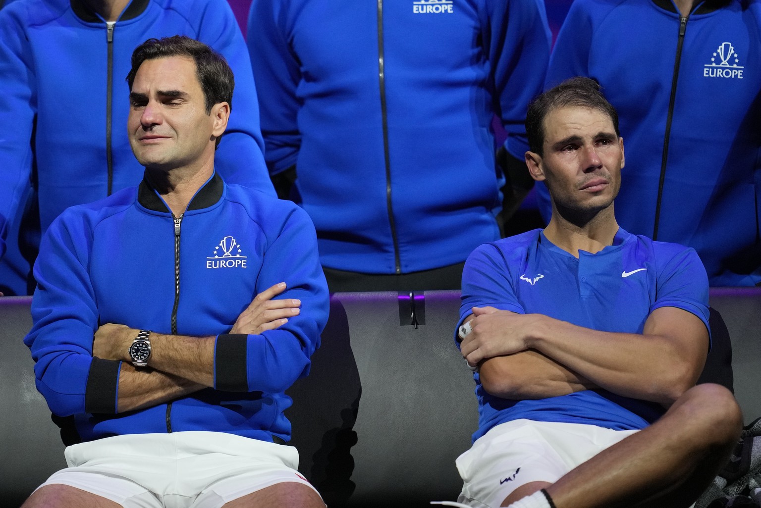 An emotional Roger Federer, left, of Team Europe sits alongside his playing partner Rafael Nadal after their Laver Cup doubles match against Team World's Jack Sock and Frances Tiafoe at the O2 ar ...