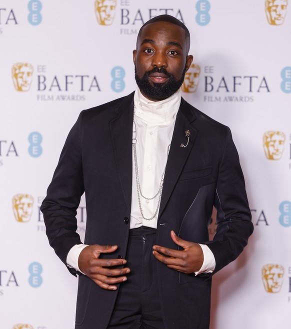 Paapa Essiedu poses for photographers at the 76th British Academy Film Awards, BAFTAs, in London, Sunday, Feb. 19, 2023. (Photo by Vianney Le Caer/Invision/AP) Paapa Essiedu