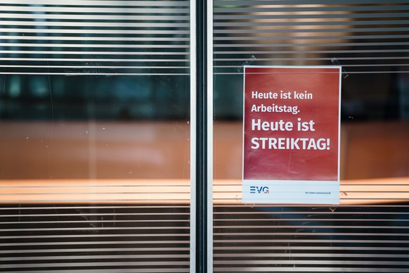 epa10545045 A message from the EVG union with the text 'Today is not a working day.  Today is strike day!'  will be placed in the closed Deutsche Bahn lounge at Berlin Central Station, during a nationwide transpo...