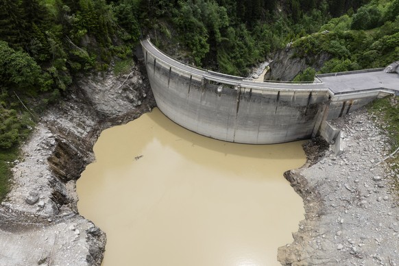 epa12149085 A view of the Ferden Dam, in Ferden, Switzerland, 01 June 2025. A large part of the Blatten village, located in the Loetschental Valley in the canton of Valais, was buried under masses of  ...