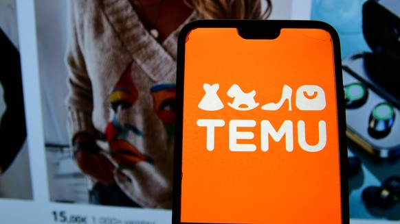 Temu company logo displayed in France - 07 Feb 2025 In this photo illustration, Chinese website for online commerce Temu is seen displayed on a smart phone screen. France Copyright: xRomainxDoucelinx/ ...