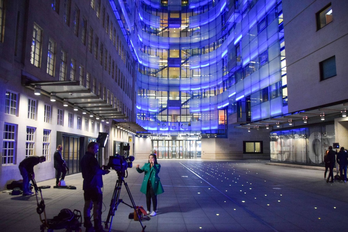 July 12, 2023, London, England, United Kingdom: Journalists stay late outside the BBC headquarters in central London as the presenter facing allegations is revealed to be Huw Edwards by his wife, acco ...