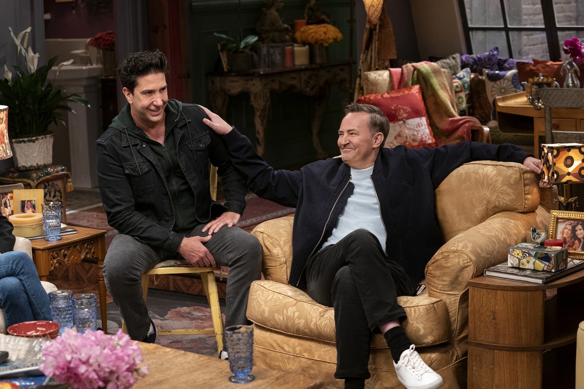 This image provided by HBO Max shows David Schwimmer, left, and Matthew Perry in a scene from the "Friends" reunion special. (Terence Patrick/HBO Max via AP)