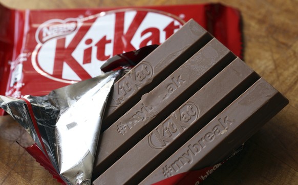 A Kitkat chocolate snack is photographed Wednesday July 25, 2018, in Rugby, England, after the European Court of Justice in Luxembourg ruled that the four-fingered shape of the KitKat chocolate bar is ...