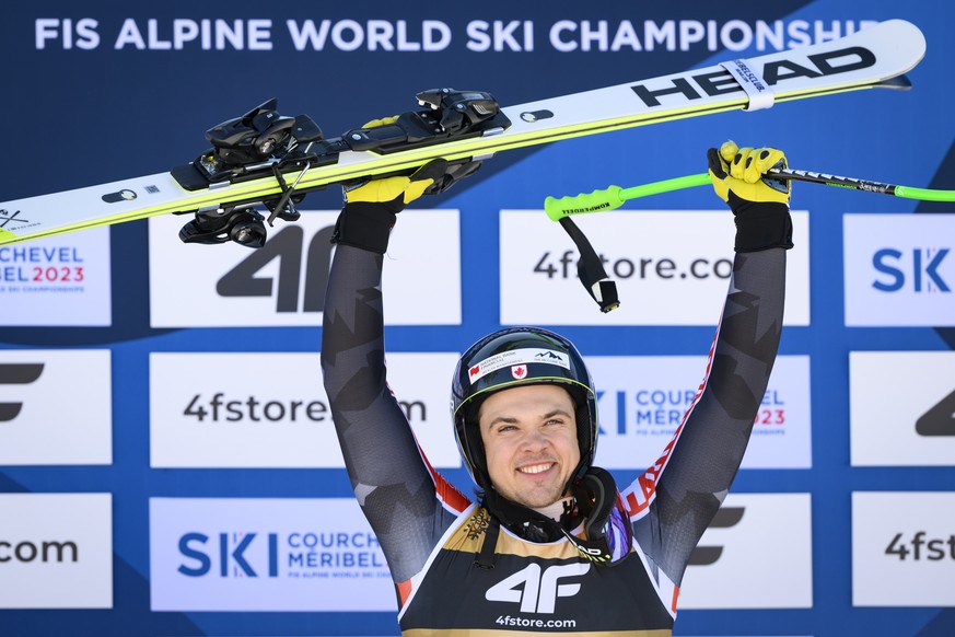 epa10456668 World Champion James Crawford of Canada reacts during the flowers ceremony of the men&#039;s super-g race at the 2023 FIS Alpine Skiing World Championships in Courchevel, France, 09 Februa ...