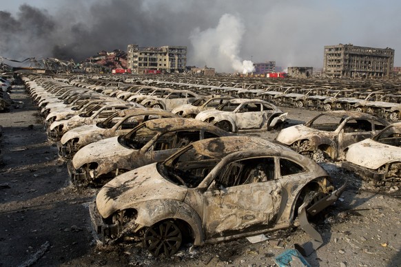 Ausgebrannte Autos in Tianjin: Die Explosion verwandelte einzelne Gebiete der Hafenstadt in No-Go-Zonen..