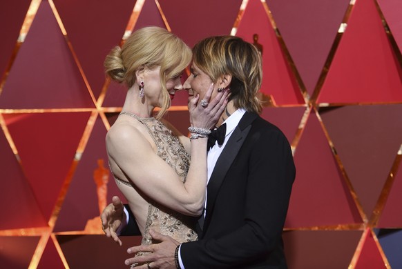 Nicole Kidman, left, and Keith Urban arrive at the Oscars on Sunday, Feb. 26, 2017, at the Dolby Theatre in Los Angeles. (Photo by Richard Shotwell/Invision/AP)