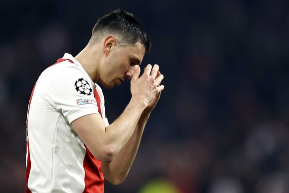 epa09827464 Steven Berghuis of Ajax is disappointed during the UEFA Champions League round of 16 soccer match between Ajax Amsterdam and Benfica Lisbon at the Johan Cruijff ArenA in Amsterdam, Netherl ...