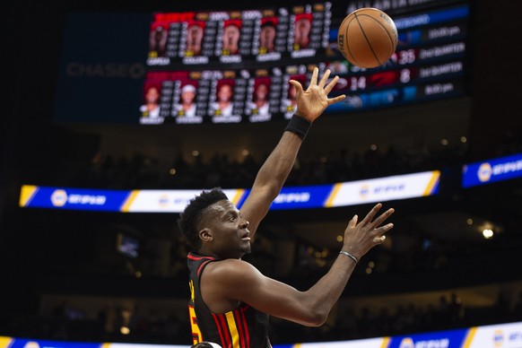 Atlanta Hawks center Clint Capela shoots, scoring against the Cleveland Cavaliers during the first half of an NBA basketball game Tuesday, March 28, 2023, in Atlanta. (AP Photo/Hakim Wright Sr.)
Clint ...
