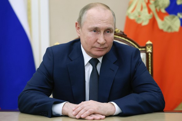 Russian President Vladimir Putin speaks via teleconference to participants of the IX Forum of Regions of Russia and Belarus in Moscow, Russia, Friday, July 1, 2022. (Mikhail Metzel, Sputnik, Kremlin P ...