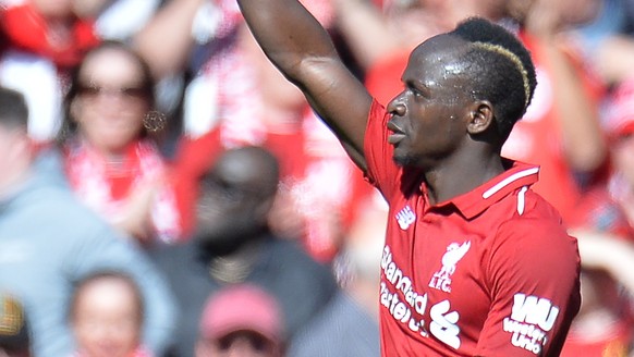 epa07564755 Liverpool&#039;s Sadio Mane celebrates after scoring the 2-0 goal during the English Premier League match between Liverpool FC and Wolverhampton Wanderers FC at Anfield, Liverpool, Britain ...