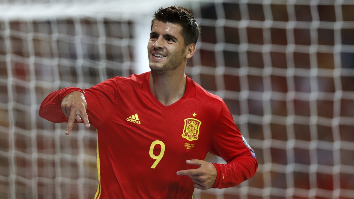 Spain's Alvaro Morata celebrates scoring his side's 3rd goal during the World Cup Group G qualifying soccer match between Spain and Italy at the Santiago Bernabeu stadium in Madrid, Spain, S ...