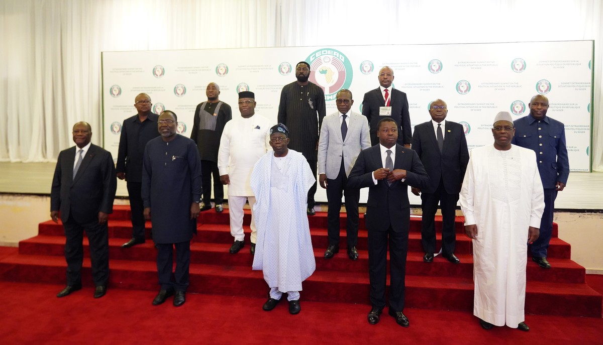 Nigeria's President, Bola Ahmed Tinubu, center first row, poses for a group photo with other West African leaders before an ECOWAS meeting in Abuja, Nigeria. Thursday, Aug. 10, 2023. West African ...