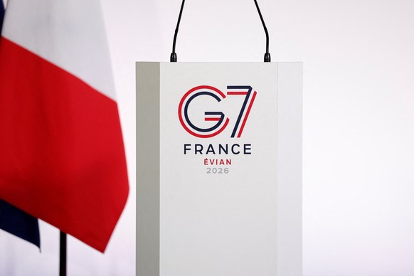 epa12936175 The logo of the G7 Evian Summit is seen on a desk during a press conference at a meeting of G7 trade ministers in Paris, France, 06 May 2026. EPA/BENOIT TESSIER / POOL MAXPPP OUT