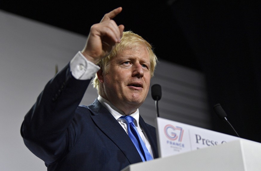 epa07795570 Britain&#039;s Prime Minister Boris Johnson speaks at a press conference at the G7 summit in Biarritz, France, 26 August 2019. The G7 Summit runs from 24 to 26 August in Biarritz. EPA/NEIL ...