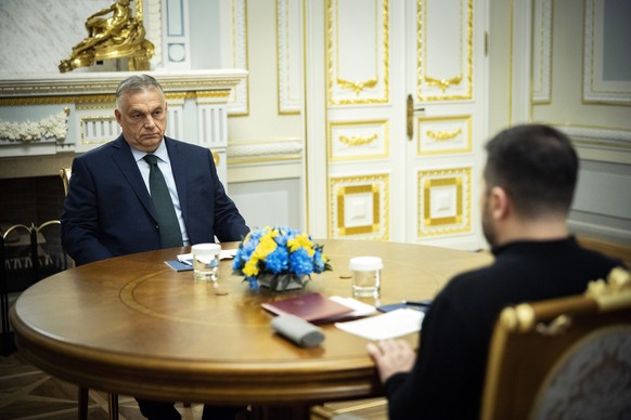In this photo issued by the Hungarian PM's Press Office Ukrainian President Volodymyr Zelenskyy, right, and Hungarian Prime Minister Viktor Orban hold a meeting in Kyiv, Ukraine, Tuesday, July 2, ...