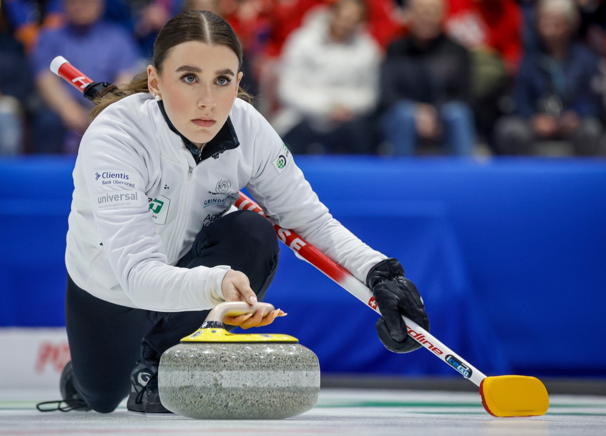 Switzerland skip Xenia Schwaller delivers a stone against Sweden in the semifinal at the World Women's Curling Championship in Calgary, Alberta, Saturday, March 21, 2026. (Jeff McIntosh/The Canad ...