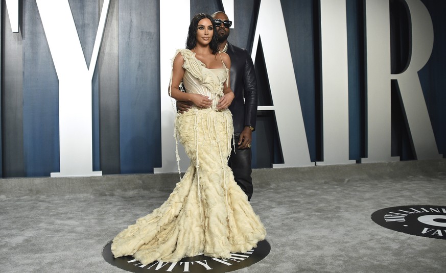 FILE - Kim Kardashian, left, and Kanye West arrive at the Vanity Fair Oscar Party on Feb. 9, 2020, in Beverly Hills, Calif. Kim Kardashian West filed for divorce Friday, Feb. 19, 2021, from Kanye West ...