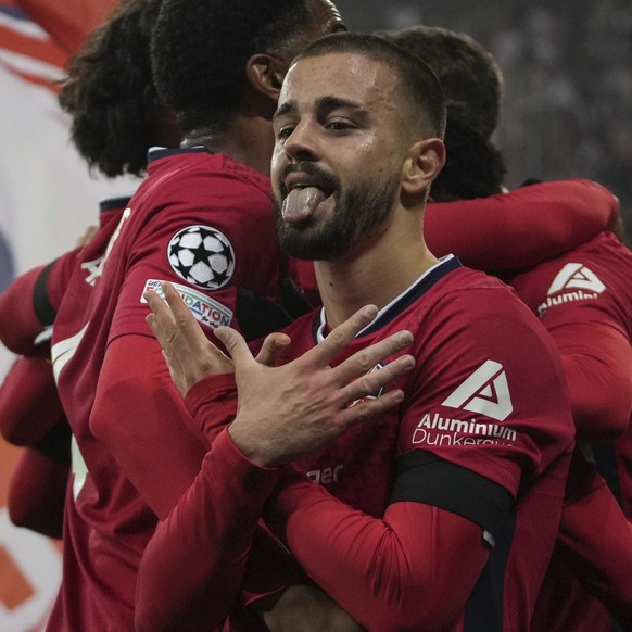 Lille&#039;s Edon Zhegrova celebrates after his team score the opening goal during the Champions League opening phase soccer match between Lille and Juventus at the Stade Pierre Mauroy in Villeneuve-d ...