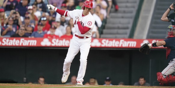 Los Angeles Angels designated hitter Shohei Ohtani (17) reacts after striking out during the first inning of a baseball game against the Boston Red Sox in Anaheim, Calif., Wednesday, June 8, 2022. (AP ...