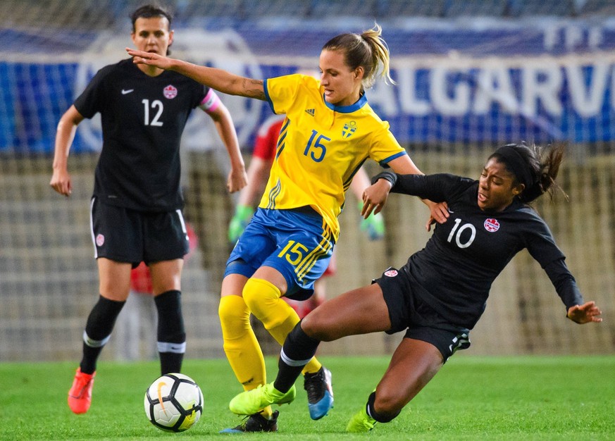 190306 Nathalie Bj�rn of Sweden against Christine Sinclair and Ashley Lawrence of Canada during the Algarve Cup 2019 match between Canada and Sweden on March 6, 2019 in Almancil. Photo: Ludvig Thunman ...