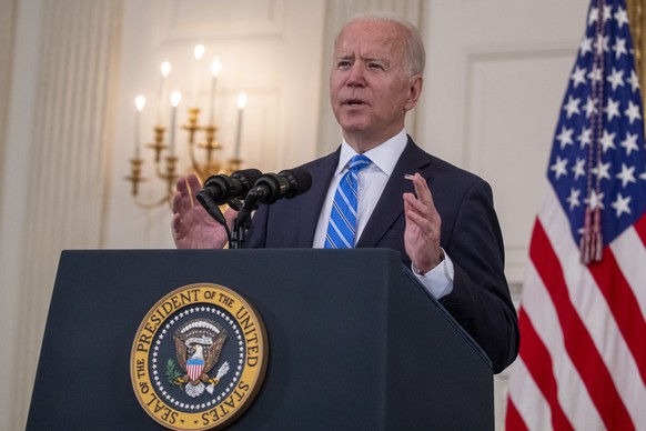 epa09353546 US President Joe Biden delivers remarks on the economy in the State Dining Room of the White House in Washington, DC, USA, 19 July 2021. A day before his six month anniversary in office Pr ...