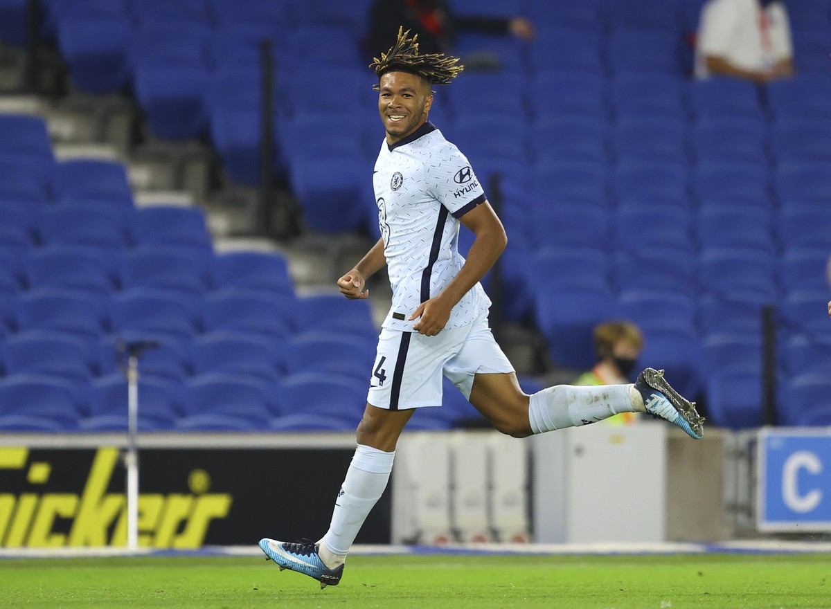 Chelsea's Reece James reacts after scoring his team's second goal during the English Premier League soccer match between Brighton and Chelsea at Falmer Stadium in Brighton, England, Monday,  ...