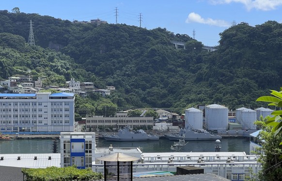 FILE - Taiwan military vessels are seen in Keelung Harbor in Taiwan, on Aug. 4, 2022. Taiwan?s Defense Ministry said a Chinese military surveillance balloon passed over the northern port city of Keelu ...