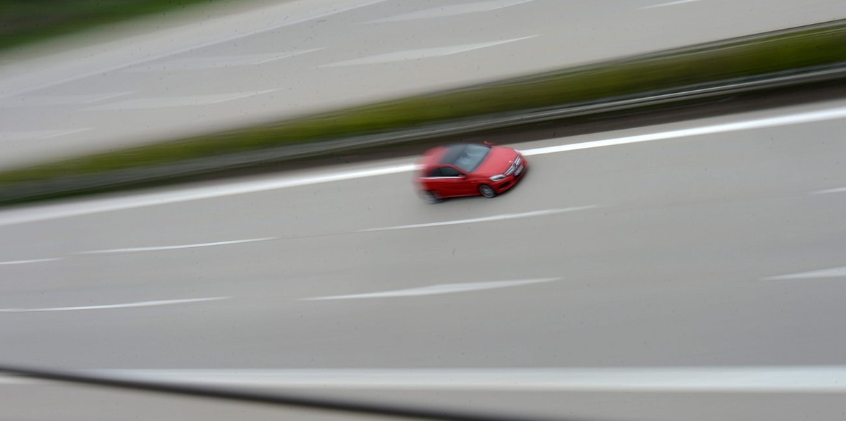 epa03692064 A photograph made available on 08 May 2013 shows a single car on the autobahn A14 near Leipzig, Germany, 07 May 2013. Politicians of the German parties Alliance '90/The Greens and the ...