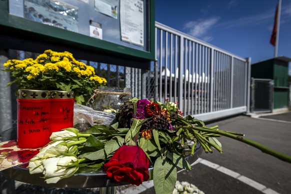 epa13206766 Flowers and candles are laid in front of the entrance to the Schachen horse racing track, following a deadly shooting at a rave party in Aarau, Switzerland, 02 September 2026. A shooting o ...