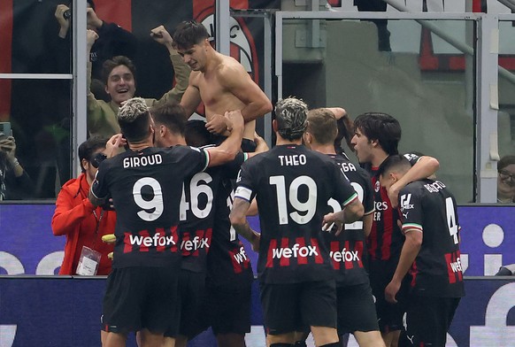 epa10231276 AC Milan���s Brahim Diaz jubilates with his teammates after scoring the 2-0 goal during the Italian serie A soccer match between AC Milan and Juventus in Milan, Italy, 08 October 2022. EPA ...