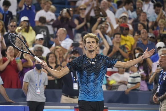 Alexander Zverev, of Germany, reacts after defeating Stefanos Tsitsipas, of Greece, during the Western &amp; Southern Open tennis tournament Saturday, Aug. 21, 2021, in Mason, Ohio. (AP Photo/Darron Cummings)
