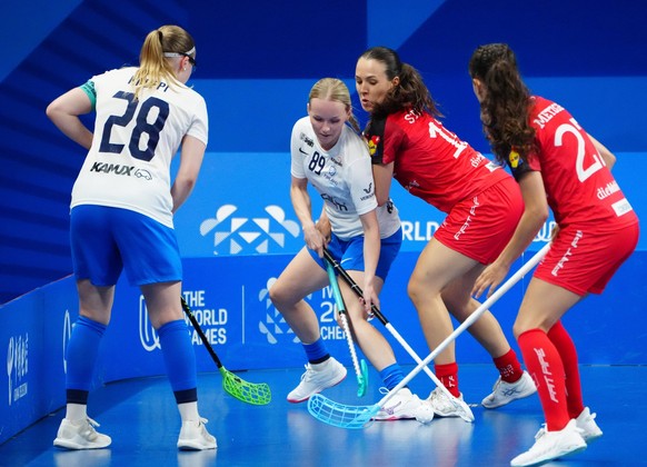 250811 -- CHENGDU, Aug. 11, 2025 -- Jenna Saario 2nd L of Finland competes during the Floorball Women s Semifinal between Finland and Switzerland at The World Games 2025 in Chengdu, southwest China s  ...