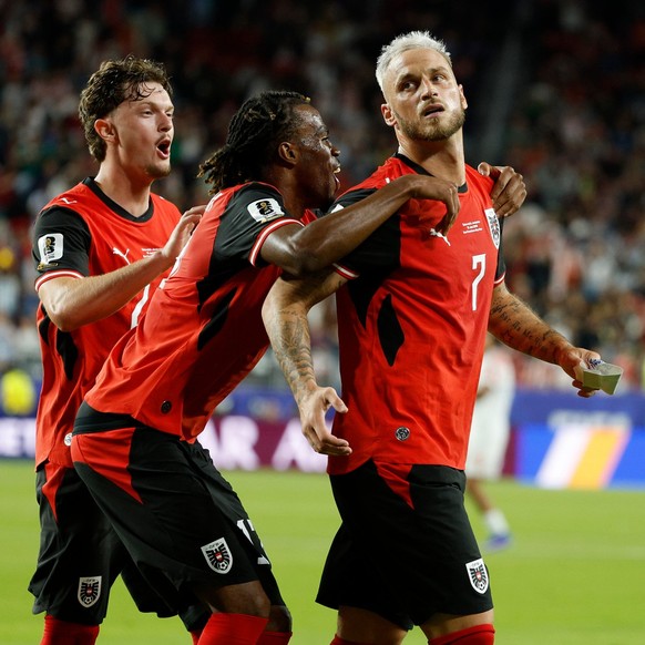 Austria's Marko Arnautovic (7) celebrates after scoring on a penalty kick during the World Cup Group J soccer match between Austria and Jordan in Santa Clara, Calif., near San Francisco, Tuesday, ...