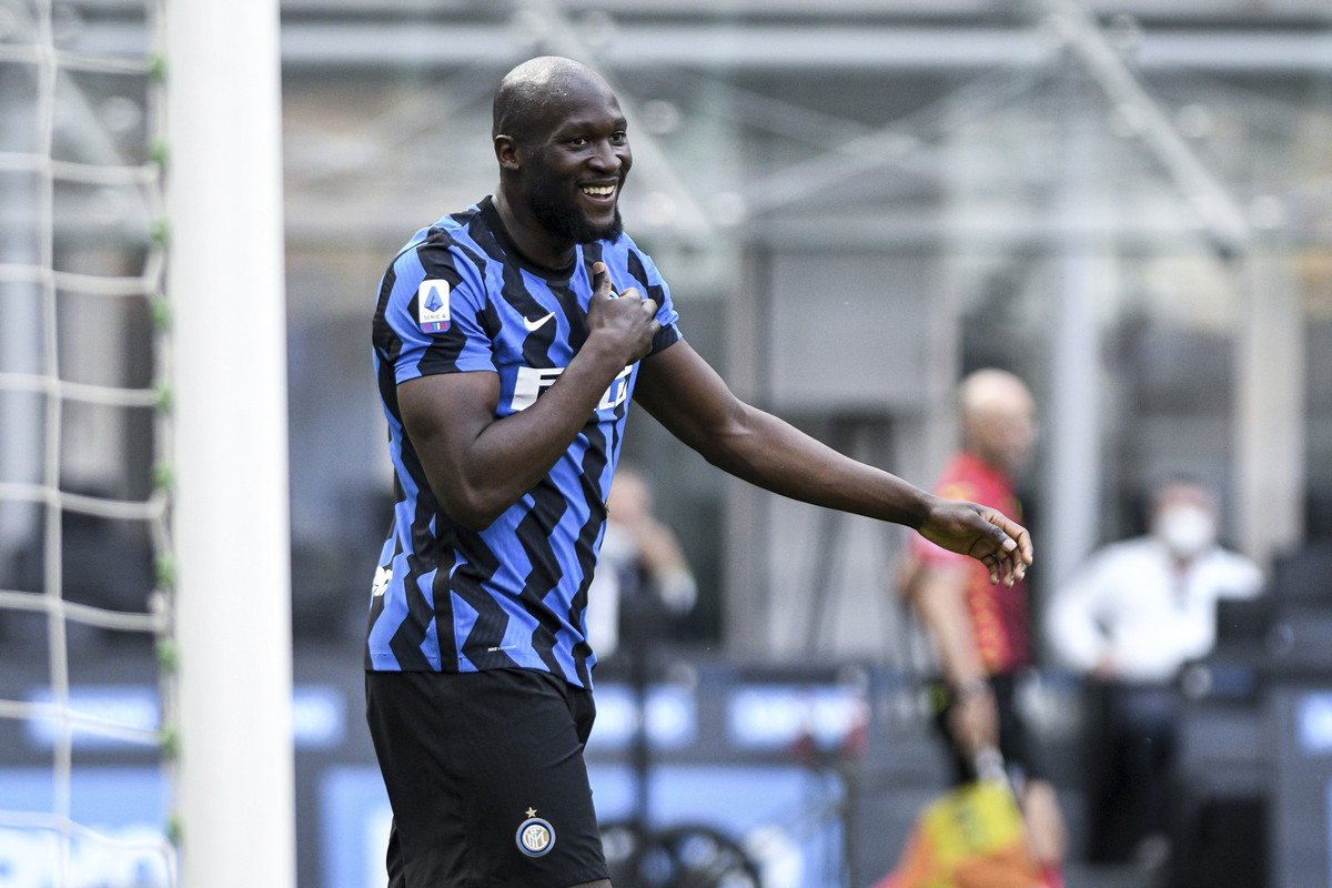 Inter Milan's Romelo Lukaku celebrates after scoring during the Serie A soccer match between Inter and Udinese, at the San Siro stadium in Milan, Italy, Sunday, May 23, 2021. Inter won its first  ...