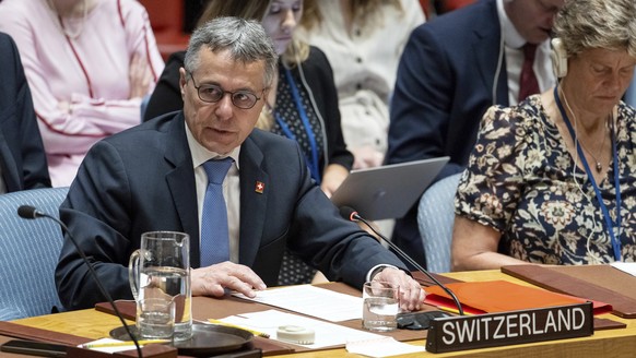 In this photo provided by the United Nations, Swiss Federal Councillor Ignazio Cassis speaks during the Security Council meeting on maintenance of international peace and security, at United Nations h ...