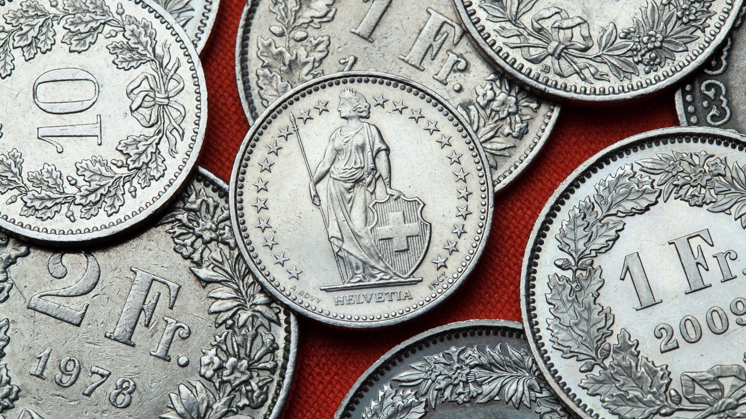 Coins of Switzerland. Standing Helvetia depicted in the Swiss half franc coin.