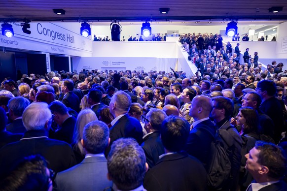 KEYPIX - People queue ahead of a plenary session featuring U.S. President Donald Trump during the 56th annual meeting of the World Economic Forum, WEF, in Davos, Switzerland, Wednesday, January 21, 20 ...