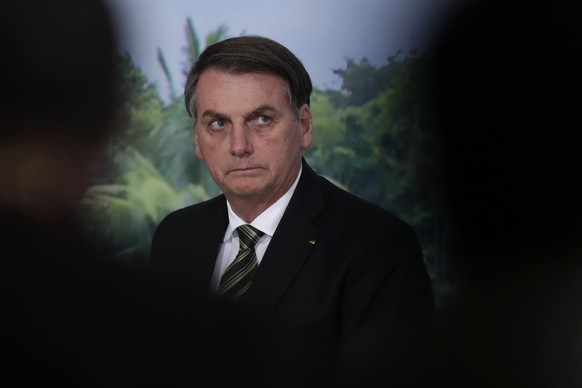 Brazil's President Jair Bolsonaro attends a ceremony to launch the Agro Nordeste program at the Palanalto presidential palace in Brasilia, Brazil, Oct. 1, 2019. According to officials, the progra ...