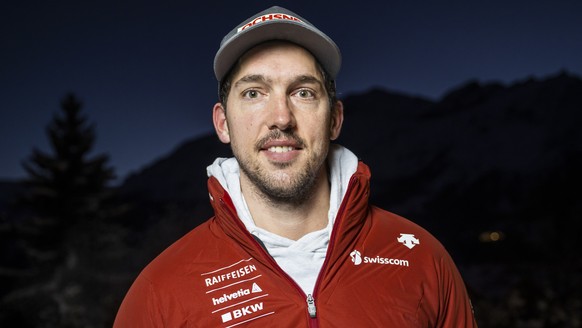 Carlo Janka of Switzerland poses for photographer during a press conference at the Alpine Skiing FIS Ski World Cup in Wengen, Switzerland, Tuesday, January 11, 2022. (KEYSTONE/Jean-Christophe Bott)