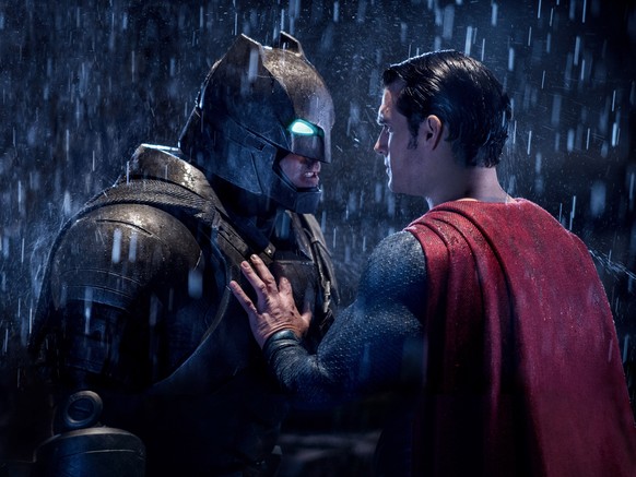 This image released by Warner Bros. Entertainment shows Ben Affleck as Batman, left, and Henry Cavill as Superman in a scene from, &quot;Batman V. Superman: Dawn Of Justice.&quot; (Clay Enos/Warner Br ...