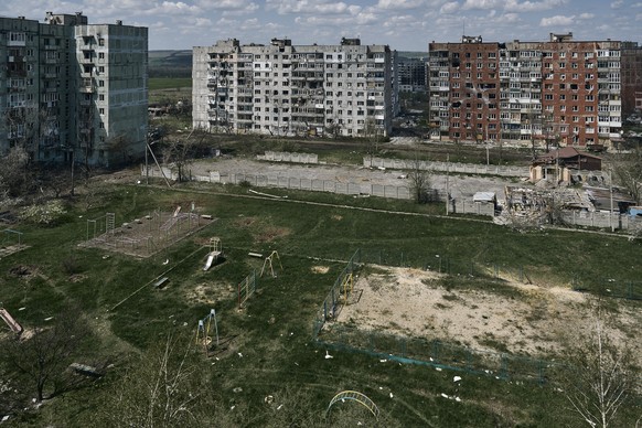 Damaged buildings in Bakhmut, the site of the heaviest battles with Russian forces in the Donetsk region, Ukraine, Wednesday, April 26, 2023. (AP Photo/Libkos)