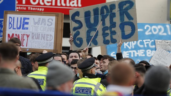 Chelsea fans protest against Chelsea&#039;s decision to be included amongst the clubs attempting to form a new European Super League before the English Premier League soccer match between Chelsea and  ...