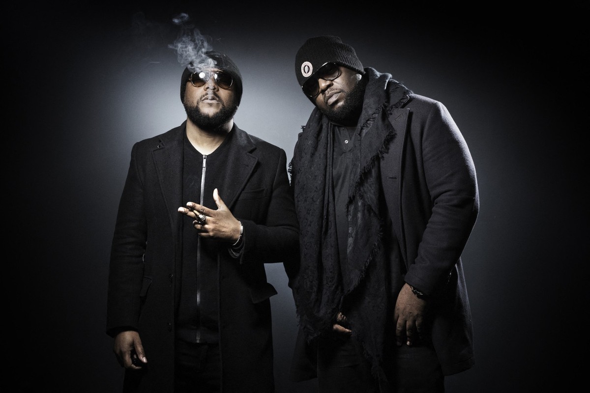Members of hip-hop band Arsenik and part of the hip hop collective Secteur A, rappers Lino (L) and Calbo (R), pose during a photo session in Paris on January 30, 2018. (Photo by JOEL SAGET / AFP)