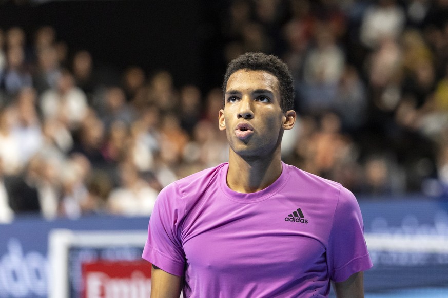 epa10275388 Felix Auger-Aliassime of Canada reacts during the final match against Holger Rune of Denmark at the Swiss Indoors tennis tournament in Basel, Switzerland, 30 October 2022. EPA/ALEXANDRA WE ...