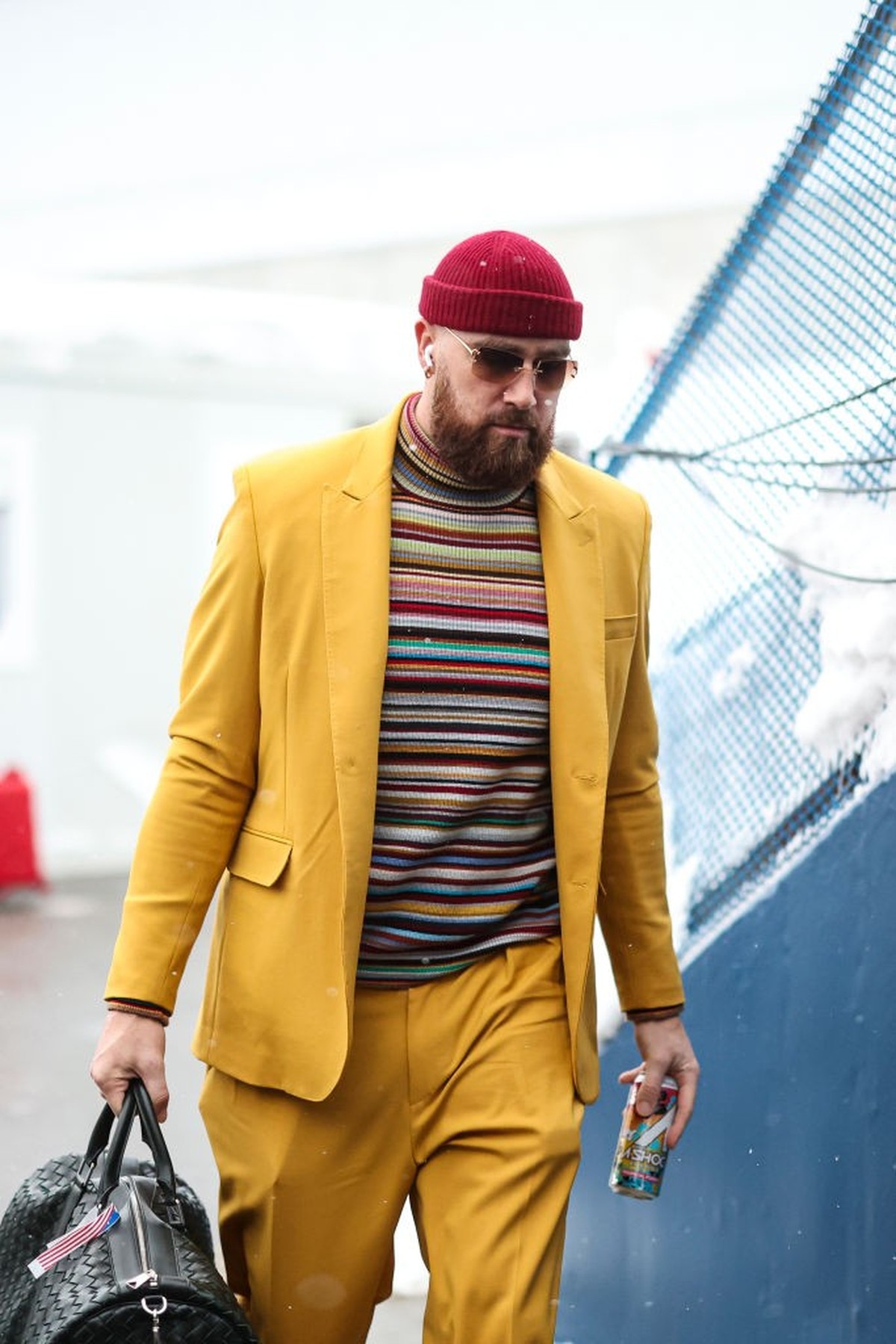 KANSAS CITY, MISSOURI - SEPTEMBER 20: Travis Kelce #87 of the Kansas City Chiefs stands on the sidelines during the national anthem prior to an NFL football game against the Indianapolis Colts at Arro ...