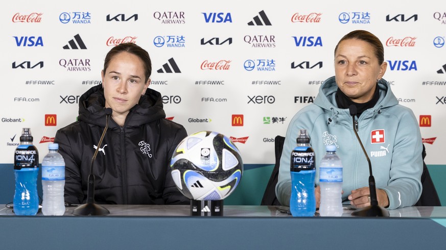Switzerland&#039;s head coach Inka Grings, right, speaks next to Geraldine Reuteler during a news conference the day before their FIFA Women&#039;s World Cup match between Switzerland and Norway at Wa ...