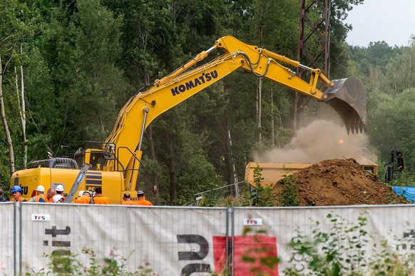 epa05489279 A digger works around the area on the 65th kilometer of the railway track Wroclaw-Walbrzych, during the attempt to explore the existence of the so-called &#039;Nazi Gold train&#039;, in Wa ...