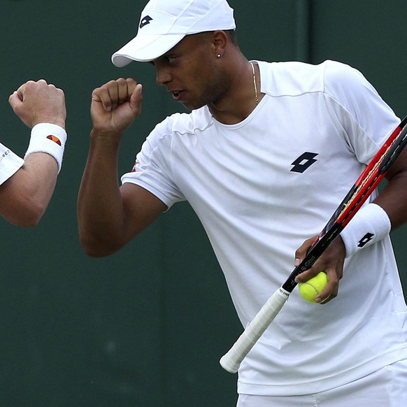 Cameron Norrie, left and Jay Clarke of Britain react after a point during the men&#039;s doubles match against Marcelo Arevalo of El Salvador and Hans Podlipnik-Castillo of Chile, on the fifth day at  ...